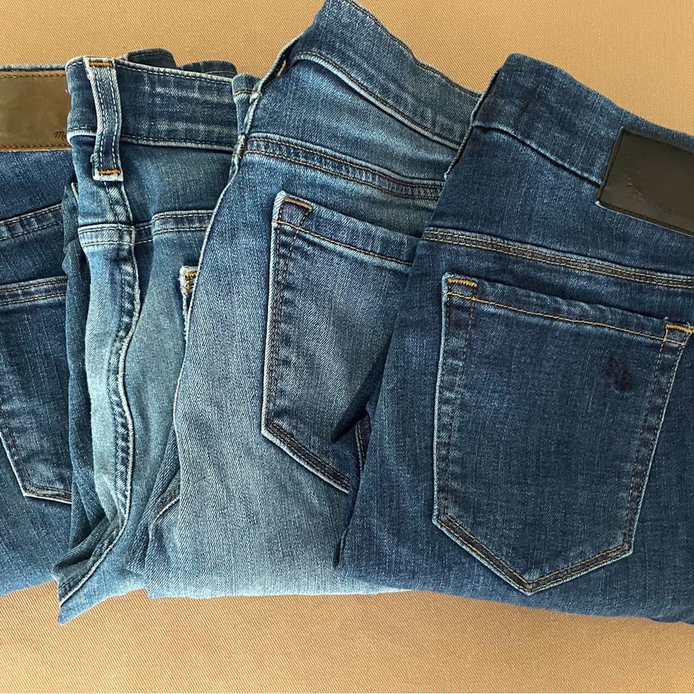 $20 for 4 pairs of blue denim jeans. Size 27.